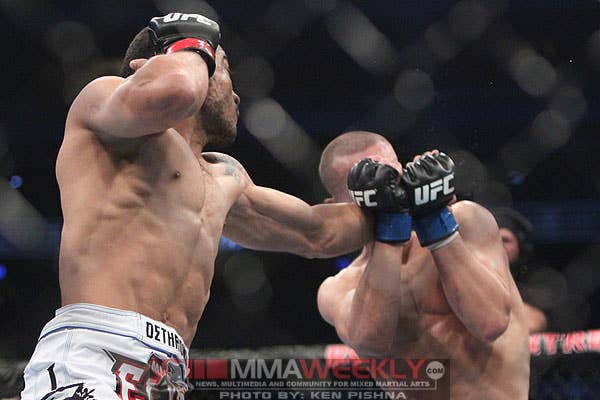 Jose Aldo and Mark Hominick at UFC 129