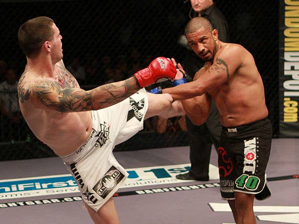 Chris Camozzi throws the kick on Joey Villasenor