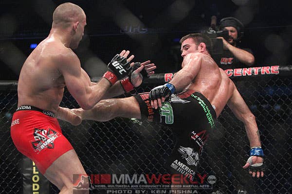 Georges St. Pierre and Jake Shields at UFC 129