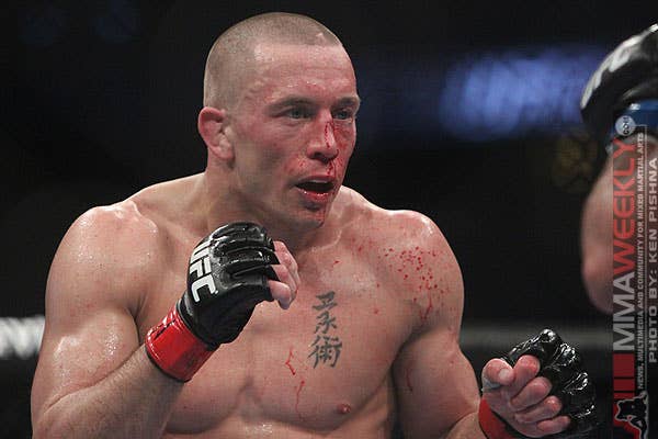 Georges St. Pierre and Jake Shields at UFC 129