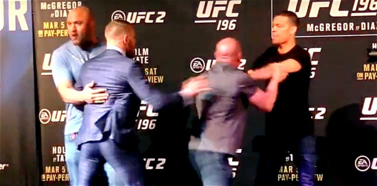 VIDEO: Conor McGregor And Nate Diaz Scuffle At UFC 196 Face-Offs ...